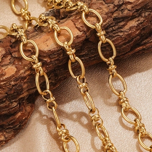 Polished 18K gold plated stainless steel hip hop chain necklace on rustic wood background