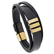 Detail of multi-layer black leather bracelet with golden metal accents and clasp