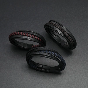 Three multilayer braided leather bracelets with magnetic clasps in black, red and blue