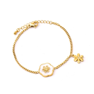 Elegant gold daisy flower bracelet with white shell charm and adjustable lobster clasp
