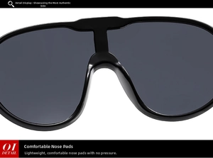 Detail of the ergonomic one-piece nose pads on black oversized fashion sunglasses
