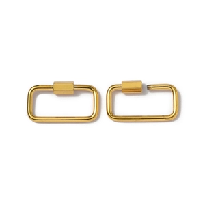 Detail of gold rectangular screw lock connectors showing open and closed mechanism