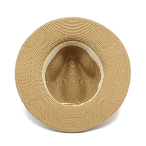 Top view of woven Panama straw hat showing classic crown texture and inner sweatband