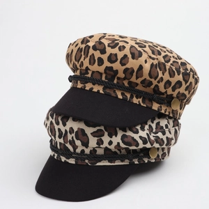 Fashionable leopard print newsboy cap with black brim and decorative braided cord accents