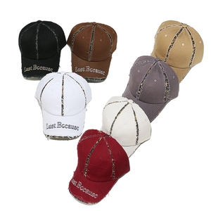 Distressed cotton baseball cap with leopard print accents and embroidery in multiple colors