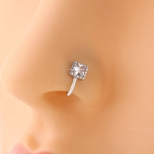 Close-up of a non-piercing silver nose cuff with a sparkling square zircon stone