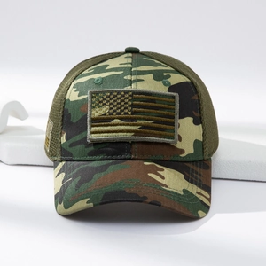 Close-up of camouflage tactical cap featuring US flag patch and breathable mesh back