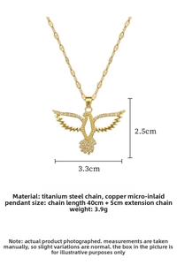 Detail view of gold owl pendant necklace showing 3.3cm by 2.5cm size and crystal inlay