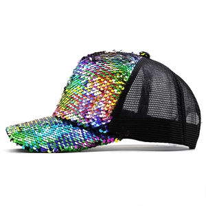 Detail showing the iridescent sequins and black breathable mesh on the baseball cap