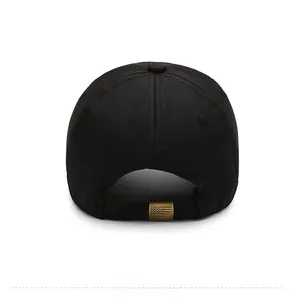 Detailed back view of black baseball cap featuring a vintage bronze metal adjustable buckle