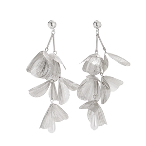 Detail view of silver metal ginkgo leaf earrings with white drop faux pearl tassels