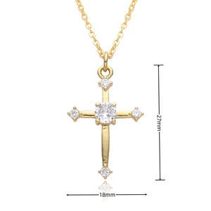 Detailed view of 27x18mm hollow cross pendant with five white cubic zirconia stones