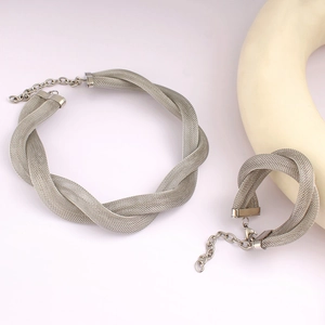 Detail of silver mesh woven necklace and bracelet set with lobster clasp and extender chain