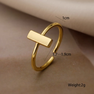 Macro shot of 18K gold plated copper ring showing 1cm width and adjustable size