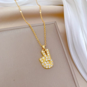 Elegant gold titanium steel necklace with sparkling crystal victory gesture pendant