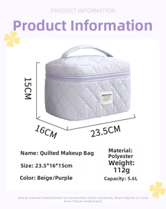 Quilted cosmetic bag detail with 5.6L capacity, handle and dimensions 23.5x16x15cm