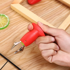 Stainless steel strawberry huller tool with non-slip red handle for fruit stem removal