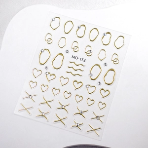 Detail of MO-153 liquid metal nail stickers with golden geometric lines and rhinestones