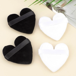 Set of heart-shaped flocking powder puffs in black and white with satin finger straps