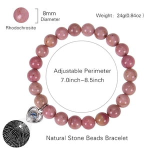 Pink agate bead bracelet with silver heart pendant featuring 100 languages projection