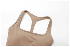 Close-up of mocha racerback sports bra with high-quality flatlock stitching and elastic fabric