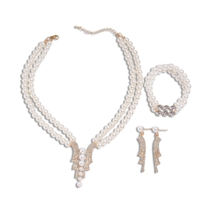 Three-piece pearl jewelry set with double-layered pendant necklace, bracelet and earrings