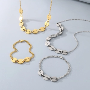 Flat oval disc link necklace and bracelet set in polished gold and silver finishes