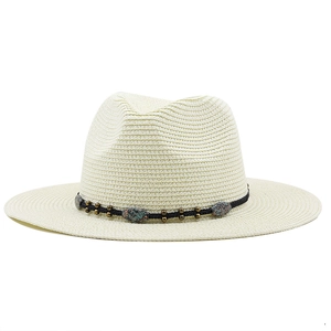 Detail of bohemian straw fedora with ethnic turquoise beads and black cord hatband