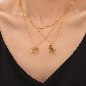 Gold-plated layered stainless steel necklace with flat snake chain and pet pendants