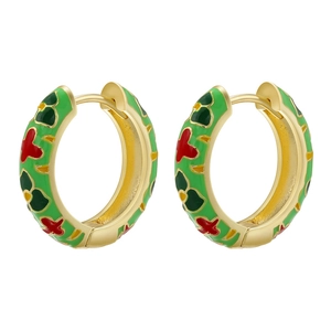 Close-up of golden C-shaped hoop earrings with colorful floral enamel details