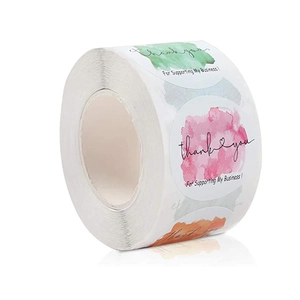 Close-up of watercolor Thank You stickers roll for small business packaging