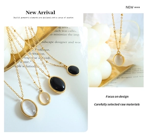 Detailed view of vintage-style oval opal pendants on delicate gold chains for women