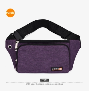 Detail view of purple sports waist pack with durable oxford fabric and headphone port
