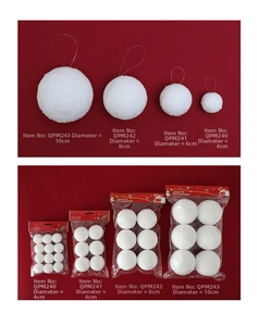 Detail view of white foam Christmas snowballs in four sizes with silver hanging strings