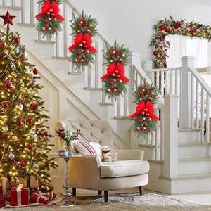 Set of 4 lighted Christmas teardrop swags with red bows, berries and pine cones for stairs