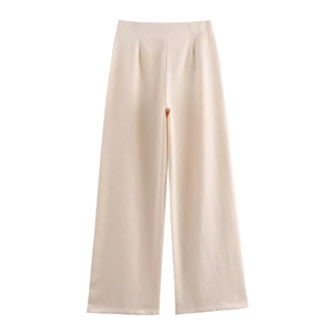 Detailed view of beige high-waisted wide-leg trousers with textured linen-blend fabric