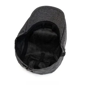 Detailed internal view of dark grey newsboy hat showing sweatband and stitching