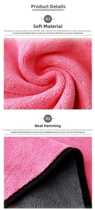 Macro view of thickened coral fleece car towel showing fluffy fibers and black edge piping
