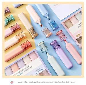 Detail of 6 soft-tip pastel highlighters with chisel nibs on a vibrant color-block background