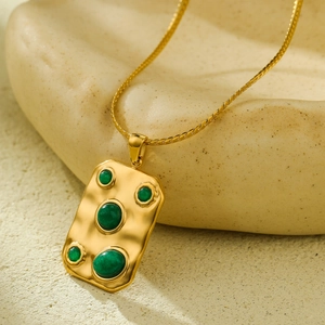 Bohemian gold plated titanium steel necklace with green stone inlay and hammered texture