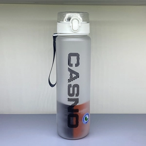 Detail of frosted grey and orange gradient sports bottle with secure pop-top lid and strap