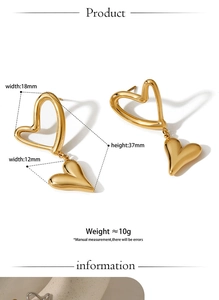 Detail view of gold heart drop earrings with precise dimensions and weight specifications