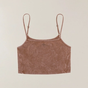 Faded rust red cropped sports tank top with thin straps and a small cross logo