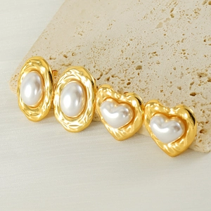Vintage heart and oval pearl stud earrings in gold stainless steel on stone