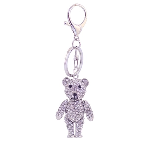 Sparkling crystal bear keychain with silver metal lobster clasp and rhinestones on white background
