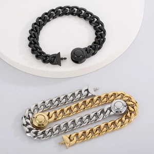 Detail of three Cuban link bracelets in black, gold, and silver with CNC diamond set clasps