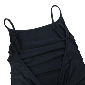 Detail shot of black slim-fit backless dress with thin straps and side ruched texture