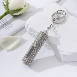 Sparkly silver rhinestone 5ml refillable perfume atomizer with a portable keychain