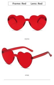 Front and side view of red heart-shaped rimless sunglasses for party fashion