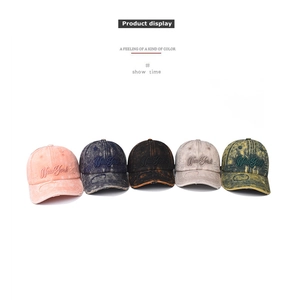 Multiple vintage washed denim baseball caps with New York embroidery and distressed holes